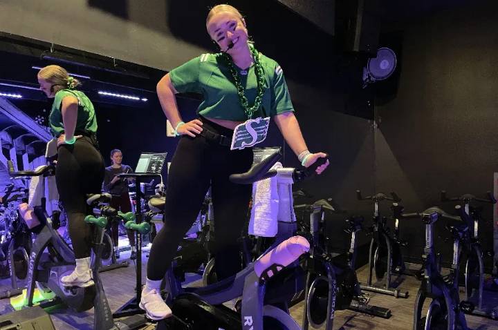 Saskatoon spin studio’s Roughrider-themed class appeals to football fans