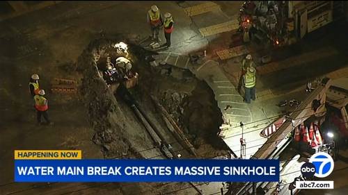 Water main break creates massive sinkhole in Woodland Hills