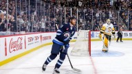 Connor’s 2 goals help Jets end Penguins point streak at 8