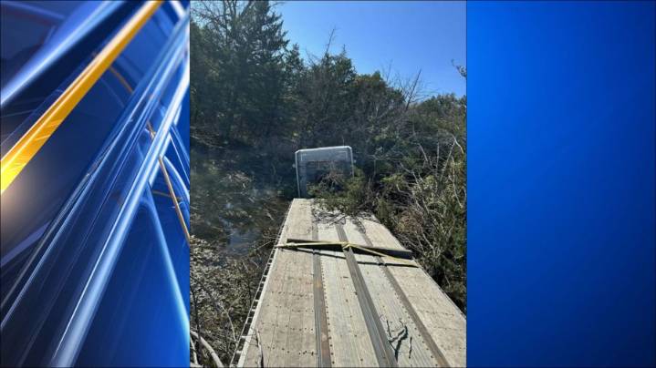 Semi crashes into pond, shutting down Kansas highway