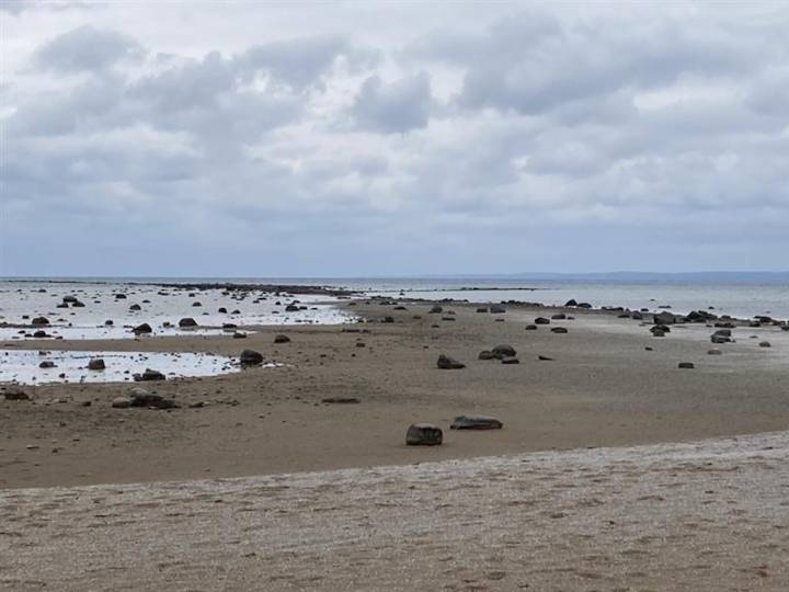 Lake Michigan and Lake Huron continue to drop; Boulders now showing at Traverse City beach