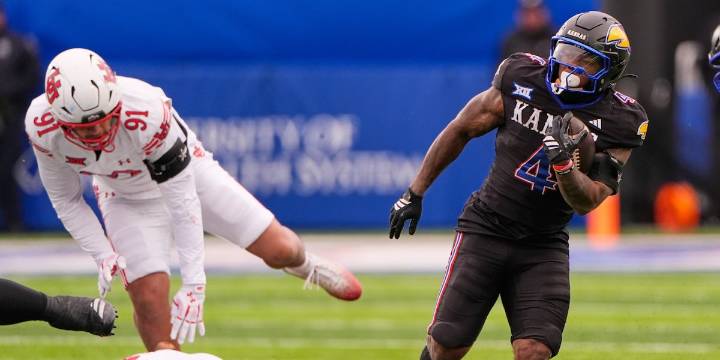 No. 14 Utah rallies to beat Kansas 31-21 and keep its slim Big 12 championship hopes alive