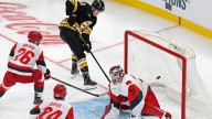 Bruins extend win streak to 3 with 2-1 victory over the Hurricanes