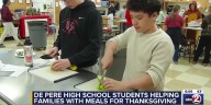 De Pere High School students cook Thanksgiving meals for families in need