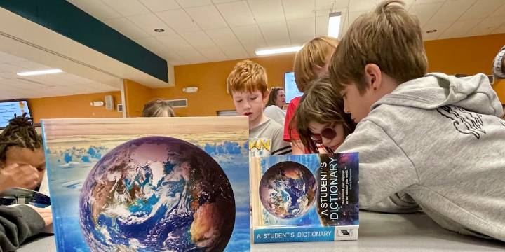 ‘Learning is a discovery’: 60 Dexter students gifted dictionaries from Valley Grange