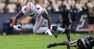 Top-ranked Ohio State faces Rutgers with uncertainty over star receivers