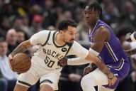 Giannis Antetokounmpo helps Lakers retrieve game ball for rookie Adou Thiero