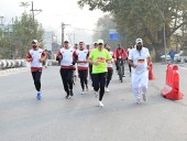 CM Omar Cheers Runners After Completing Kashmir Half Marathon