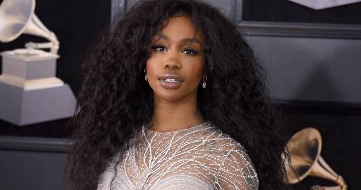 SZA Poses on Piano in Sheer Dress for GQ