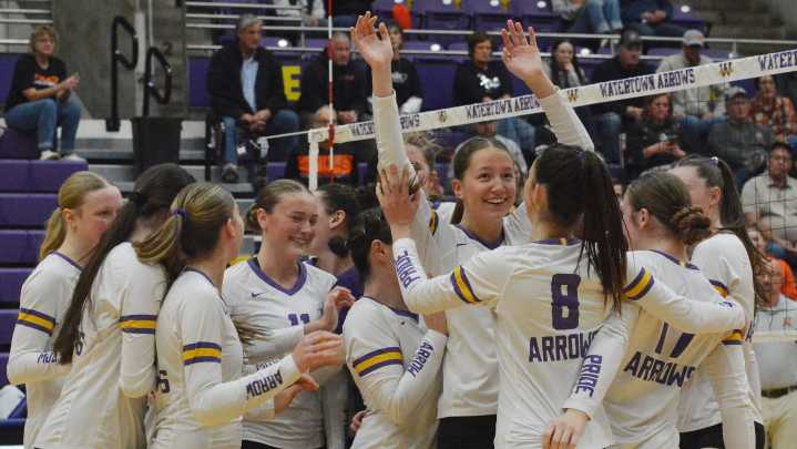 Watertown celebrates Class AA SoDak 16 volleyball victory over Huron