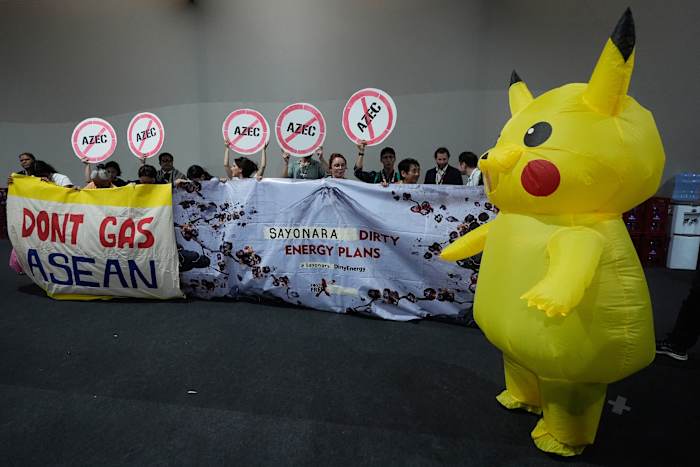 Protesters in Pikachu costumes demand Japan end fossil fuel financing at UN climate conference