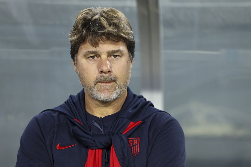 Soccer-Terse Pochettino blasts ‘disrespectful’ question about regulars after US thrash Uruguay