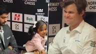 SPORTS Old Video of Magnus Carlsen Playing Chess With 4-Year-Old Little Girl Gauri Asha On Sidelines of Match With D Gukesh Goes Viral