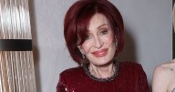 Sharon Osbourne holds onto daughter Kelly in first public appearance since Ozzy's death