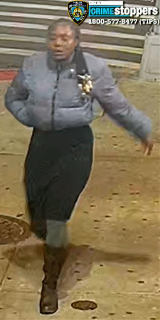 Woman robbed senior, cops say