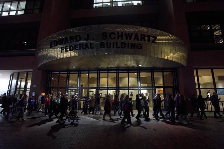 Lawsuit challenges arrests of people showing up to ICE check