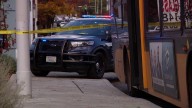 Man shot in chest after altercation on Metro bus spills onto Seattle street; 1 in custody
