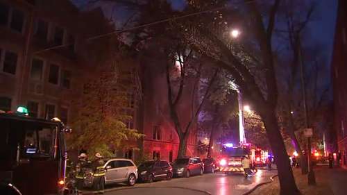 Chicago firefighters battle building fire in South Shore at 7558 S Kingston Avenue on Saturday
