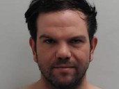 Man pleads guilty to police station petrol bomb attack