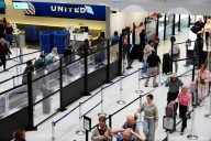 The Latest: Hundreds of flights canceled nationwide due to government shutdown