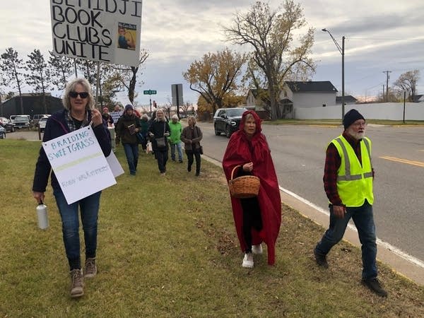 Book lovers protest proposed cuts to Bemidji library