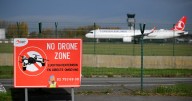 U.K. sends anti-drone troops to Belgium as airports shut down amid warnings of Russian "hybrid warfare"
