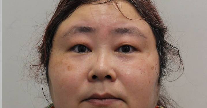 Moment billionaire 'Bitcoin Queen' arrested in bed after UK's largest