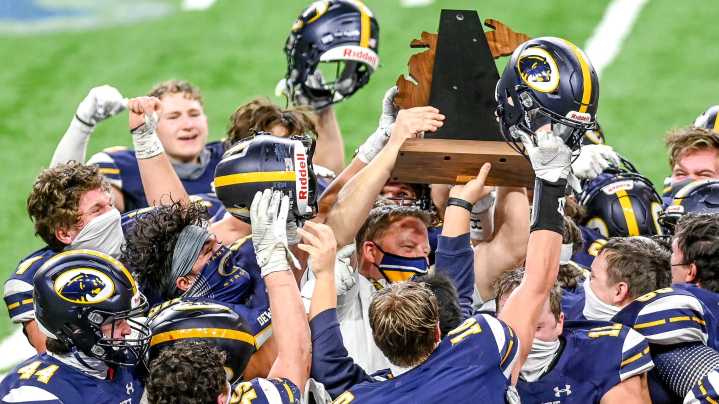 Lansing area High School football state champs through the decade
