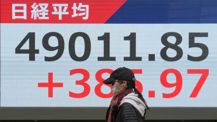 Global stocks rise after Wall Street gets a boost from hopes for interest rate cuts