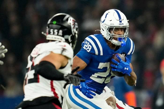 Taylor runs for 244 yards and 3 TDs for Colts in 31-25 OT win over Falcons in Berlin