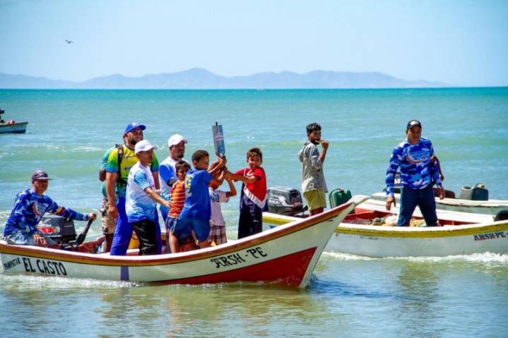 Fuego Patrio de los Juegos Comunales enciende llama de la fraternidad