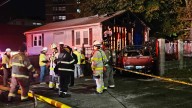 House catches fire after truck crashes into it in Providence