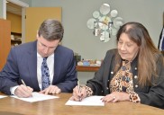 Rainbow board, N’Swakamok school sign memorandum of understanding