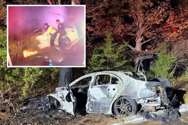 Dash cam captures NJ police rescue as fire engulfs car
