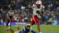 Lateef's impressive debut as a starter and Johnson's rushing lead Nebraska over UCLA 28