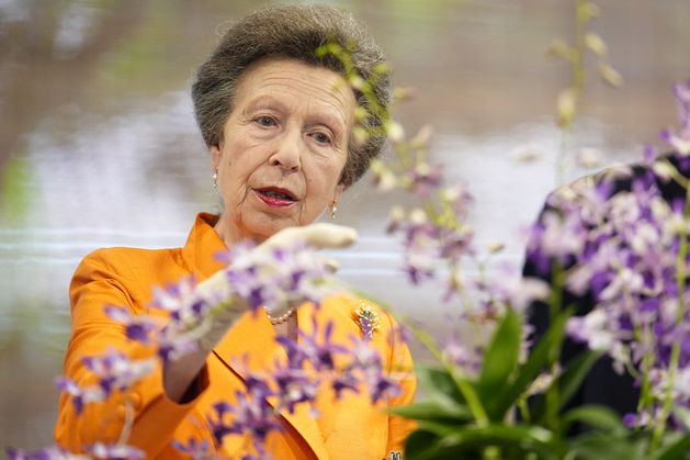 Anne admires flower named after late royal in Singaporean botanic garden