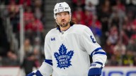 Tanev taken from ice on stretcher during Maple Leafs game