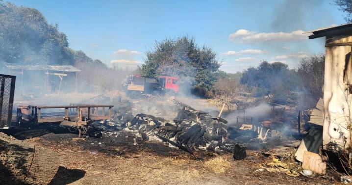 Mobile home damaged as brush fire spreads in Clay