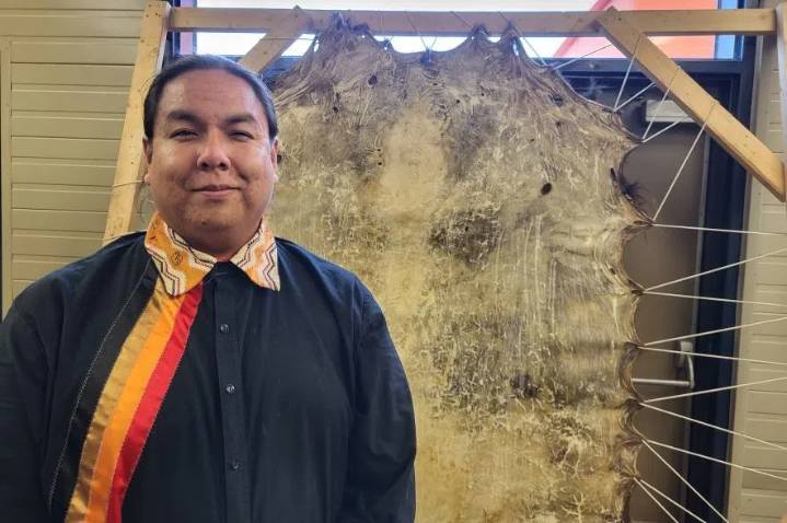 ‘Hard work’: Agribition booth teaches visitors how to scrape Buffalo hide