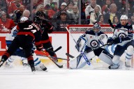 Jarvis scores a hat trick as Hurricanes pull away in third period to beat Jets 5