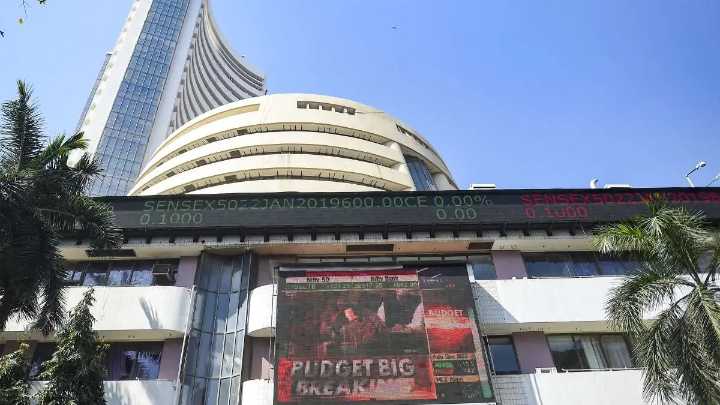 Sensex, Nifty settle with  modest gains amid see