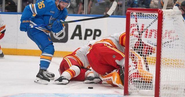 Walker, Binnington lead Blues to 3-2 win over struggling Flames