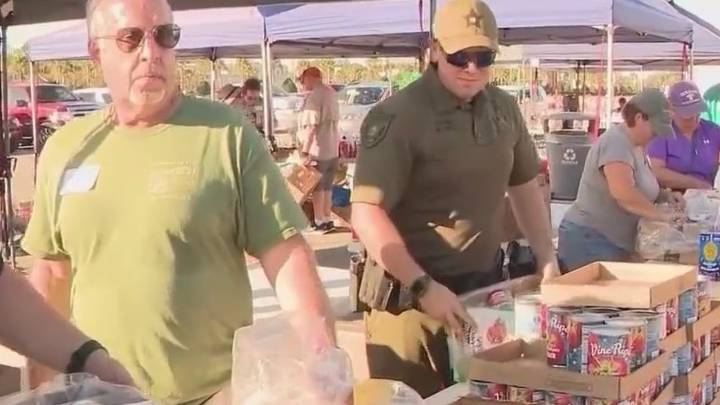 Volunteers hand out food for Volusia County families