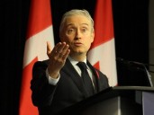 Budget more than doubles deficit, includes big spend on infrastructure