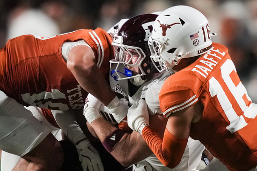 Texas A&M's perfect season spoiled by rival Texas, but playoffs await for the Aggies