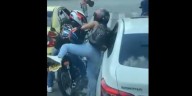 Detuvieron a un hombre y una mujer que protagonizaron violento asalto en Cali y dispararon a un conductor en plena calle