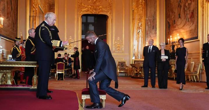 Bend a knee like Beckham: Soccer star is knighted by King Charles III
