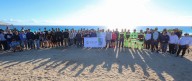 Reforesta Ana Paty Peralta duna costera de playa Delfines