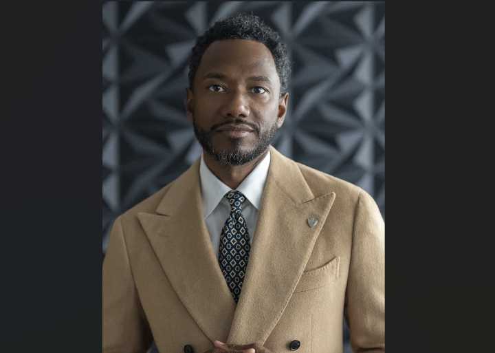 Dapper Denver realtor tries on fundraising hat
