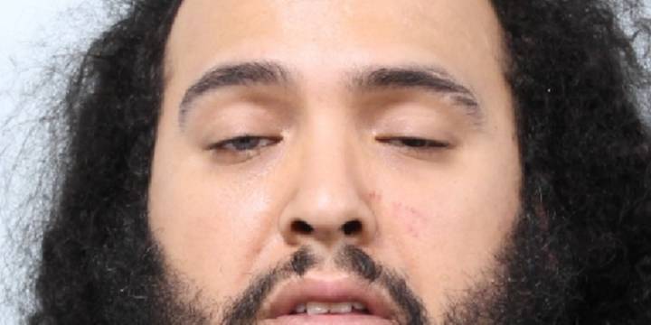 Suspect bites police during arrest